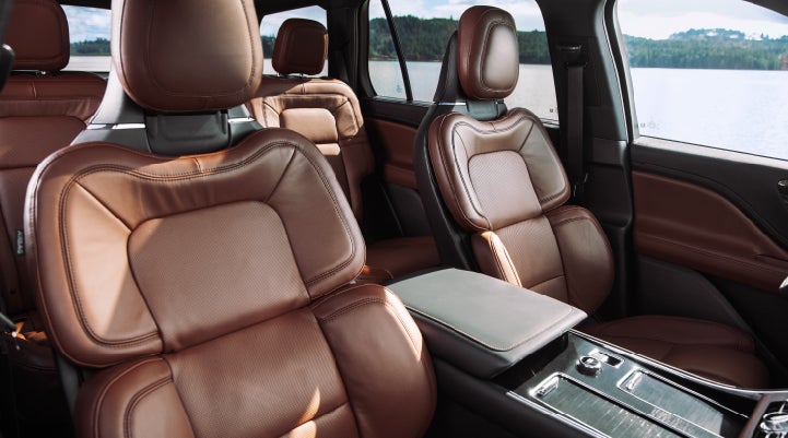 The front row's Perfect Position Seats in a 2024 Lincoln Aviator® Reserve model with Ebony Roast interior | Preston Lincoln in Hurlock MD